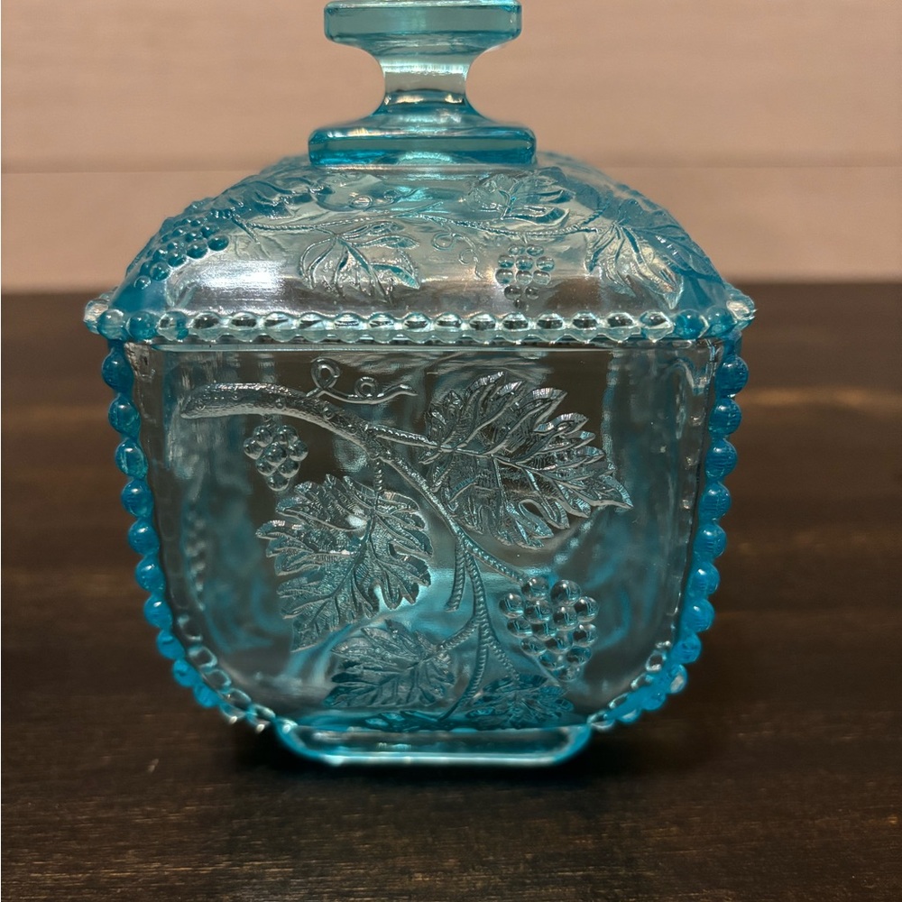 Vintage pressed glass sugar jar with lid.